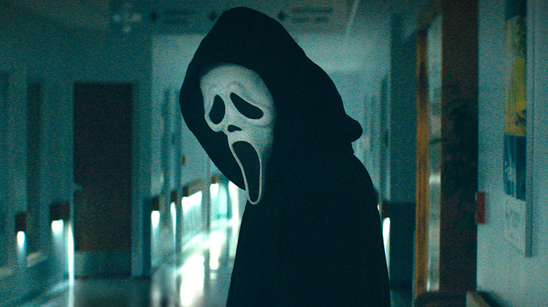 Ghostface in a hallway in Scream