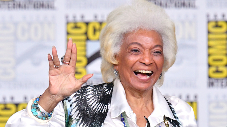 Nichelle Nichols giving a Vulcan salute