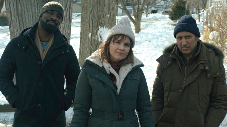 Kristen, David, and Ben standing outside together