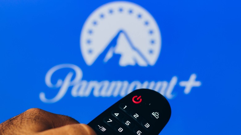 A remote control pointed at the Paramount+ logo