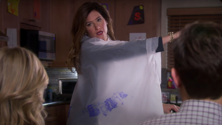 Kathryn Hahn wearing a poncho