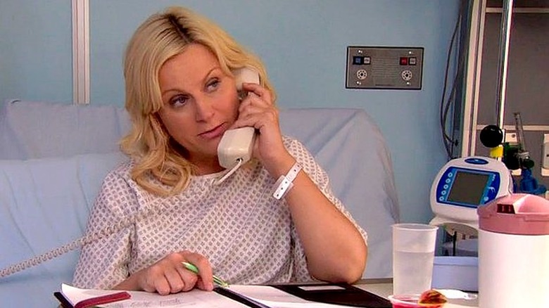 Leslie on phone in hospital