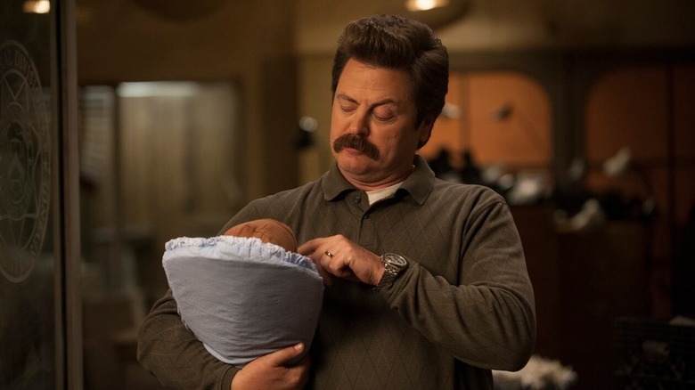 Ron doting on his son