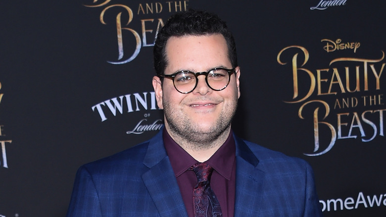 Josh Gad smiles at a film premiere