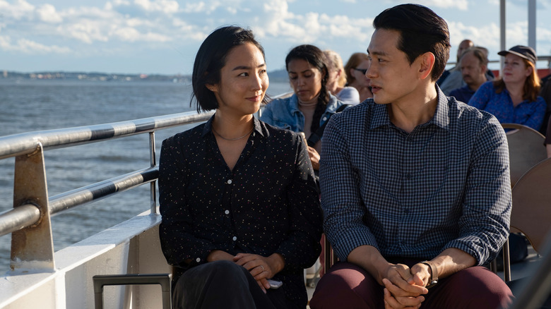 Hae-Sung and Nora riding ferry