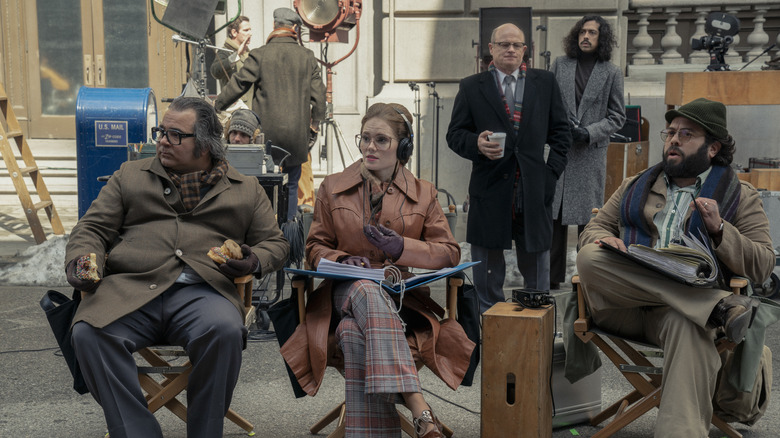 The cast of The Offer waiting between takes