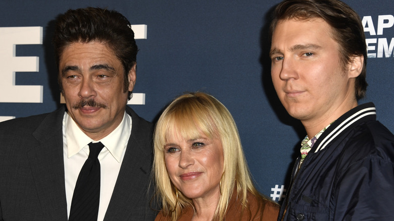 Benicio del Toro, Patricia Arquette, and Paul Dano posing on red carpet