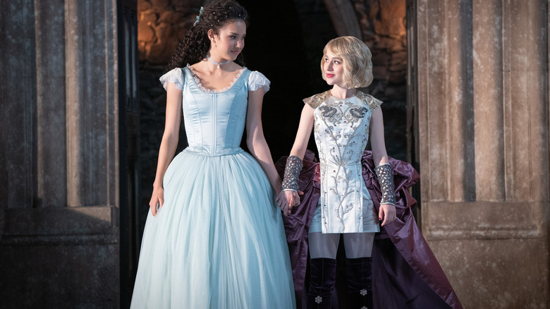 Agatha and Sophie holding hands in The School for Good and Evil