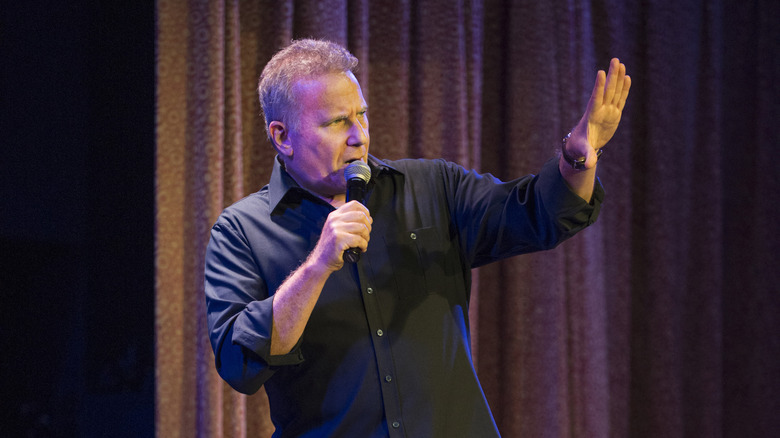 Reiser on stage at a standup show