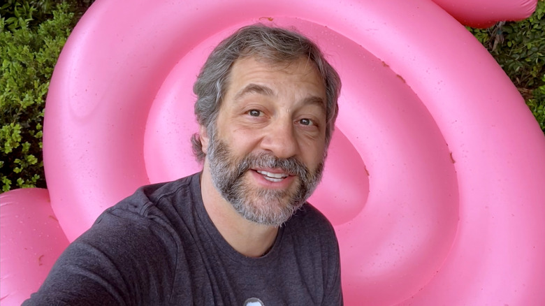 Judd Apatow with pink background