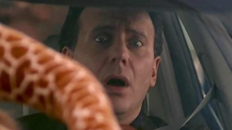 Shocked Paul Buchman driving car