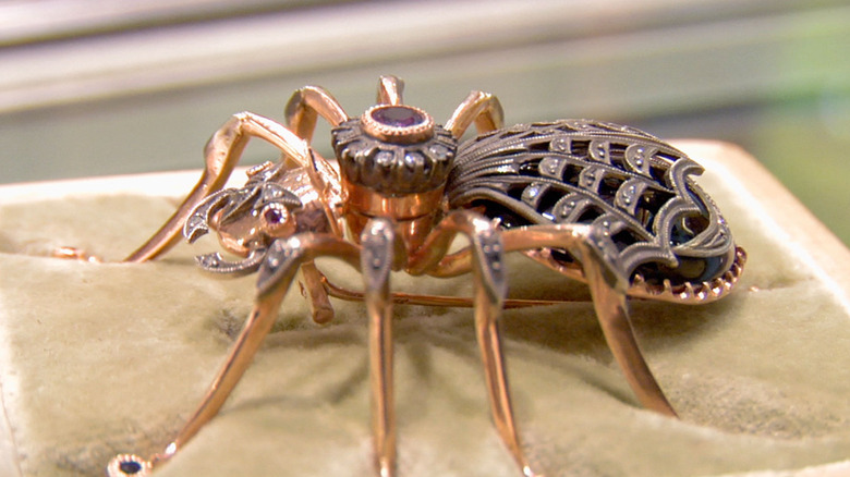 Faberge spider brooch resting