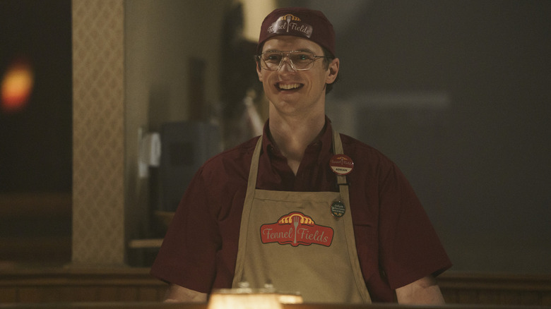 Freddie Stroma smiles as Adrian Chase (aka Vigilante) in "Peacemaker"