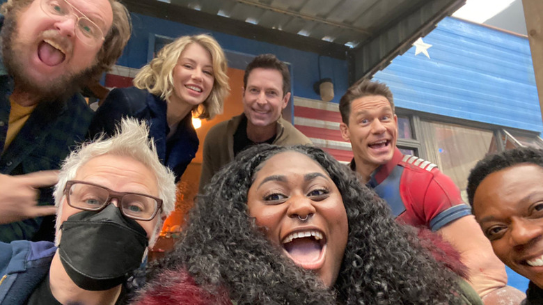 The Peacemaker Cast and James Gunn in a group shot