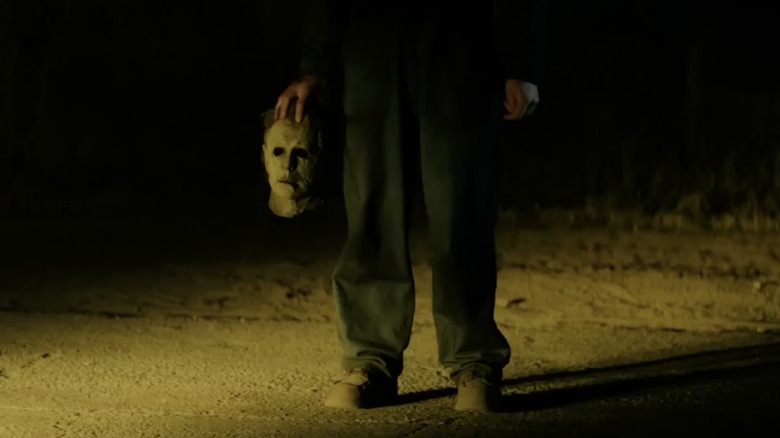 Corey Cunningham holding the Michael Myers mask