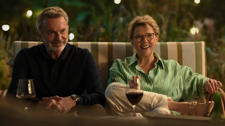 Sam Neill and Annette Bening smiling