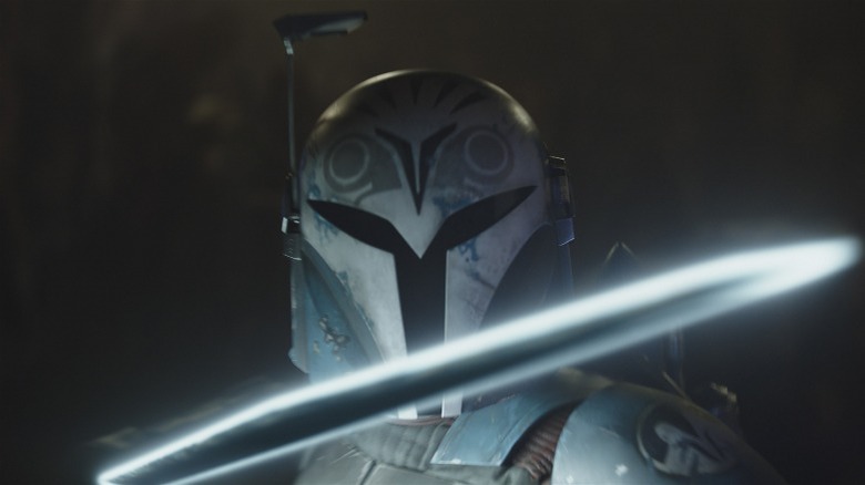 Bo-Katan holding the Darksaber