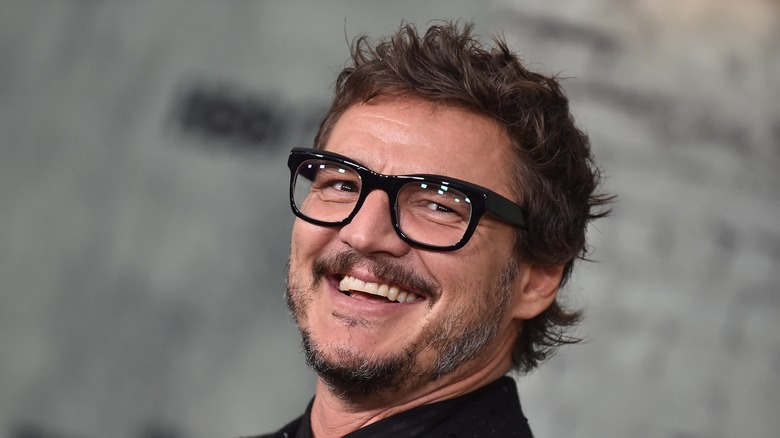 Pedro Pascal sits at premiere