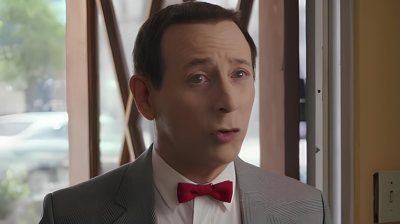 Pee-wee Herman wearing a suit