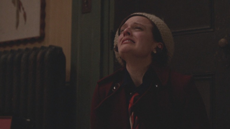 Peggy sobs in apartment