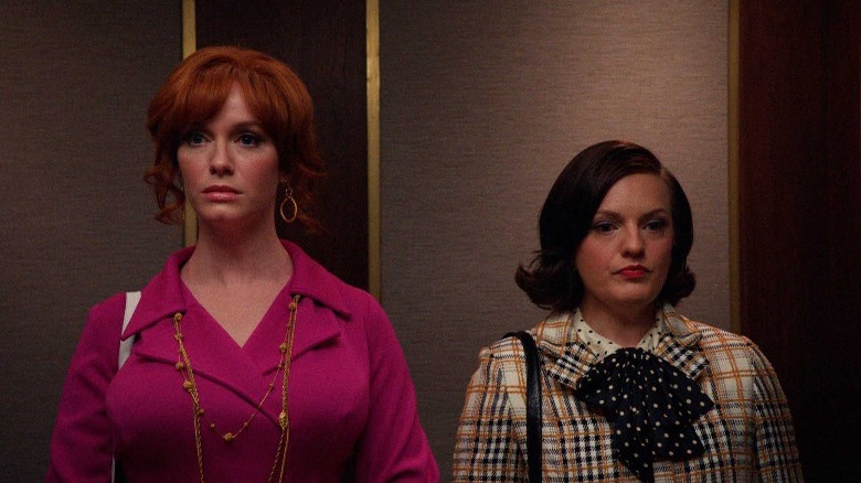 Joan and Peggy ride elevator