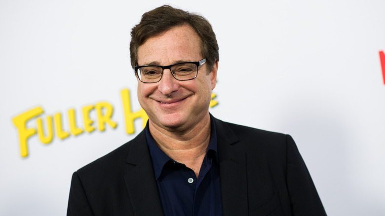 Bob Saget smiling at premiere