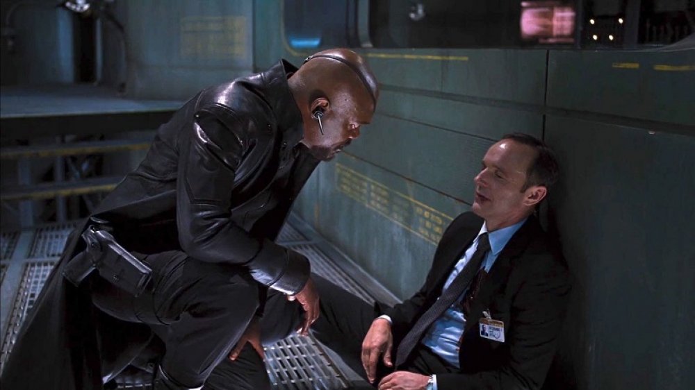 Nick Fury comforts a dying Agent Phil Coulson in The Avengers