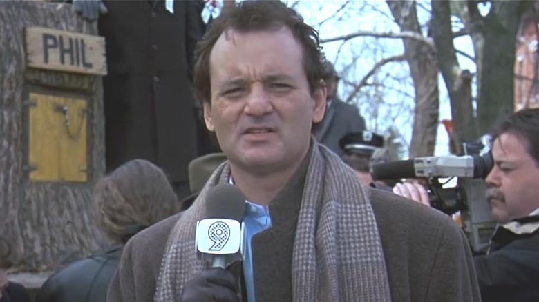 Phil Connors angrily reporting on Groundhog Day 