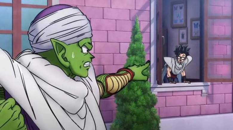 Piccolo points at Gohan