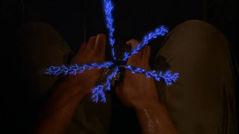 The puzzle box shocking in Hellraiser