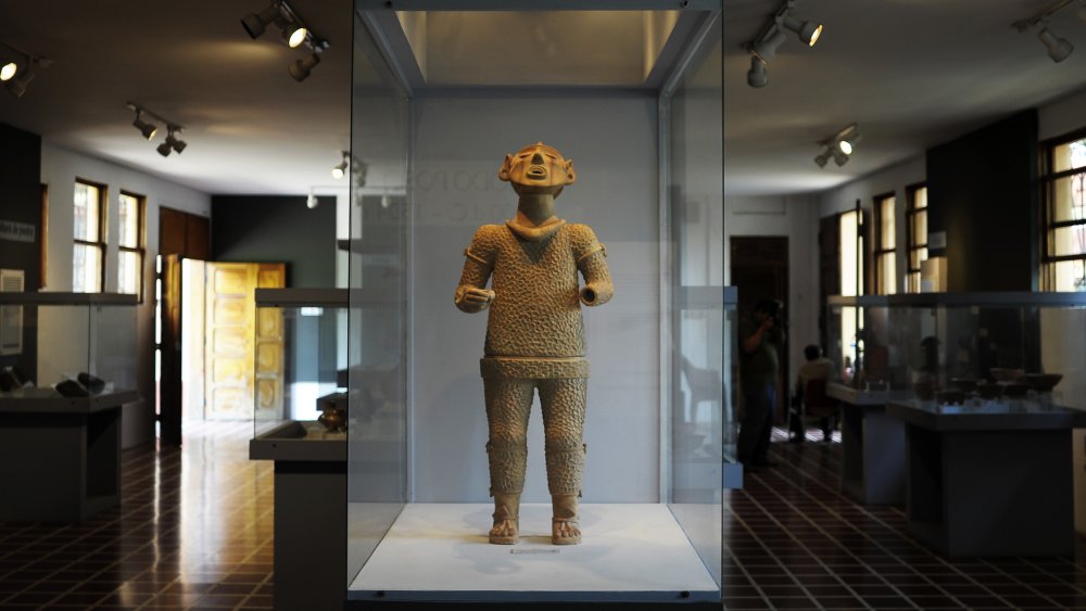 Statuette of Xipe Totec, Aztec god, at the museum of El Tazumal archaeological site in Chalchuapa