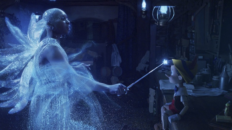 The Blue Fairy blessing Pinocchio with intelligence