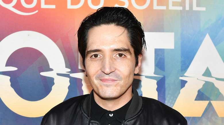 David Dastmalchian with multicolor background