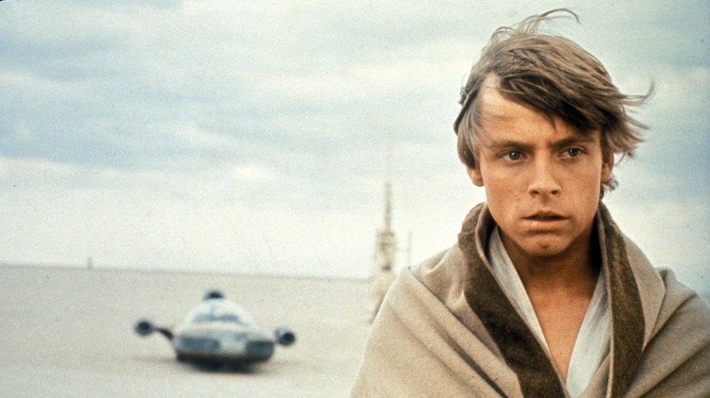 Star Wars: Episode IV - A New Hope's Luke Skywalker looking sad in sand