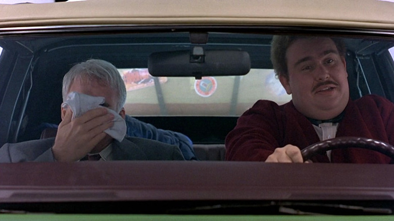 John Candy driving