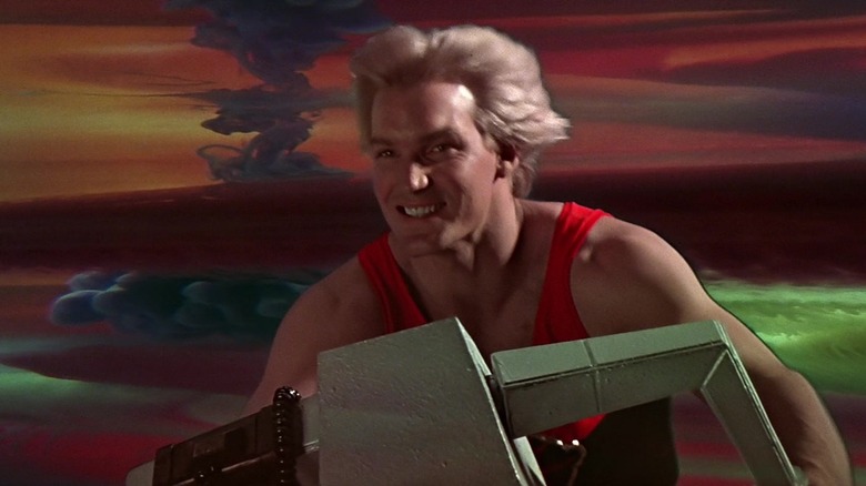 Flash Gordon smiling riding vehicle