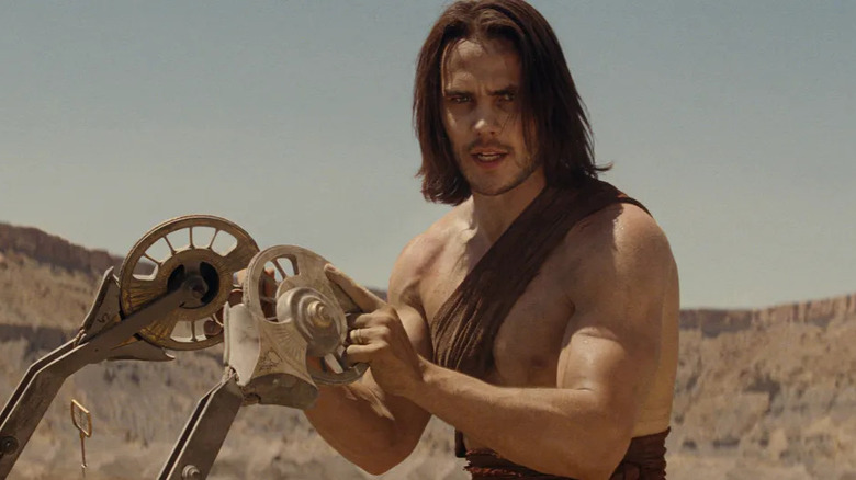 John Carter pilots a vehicle