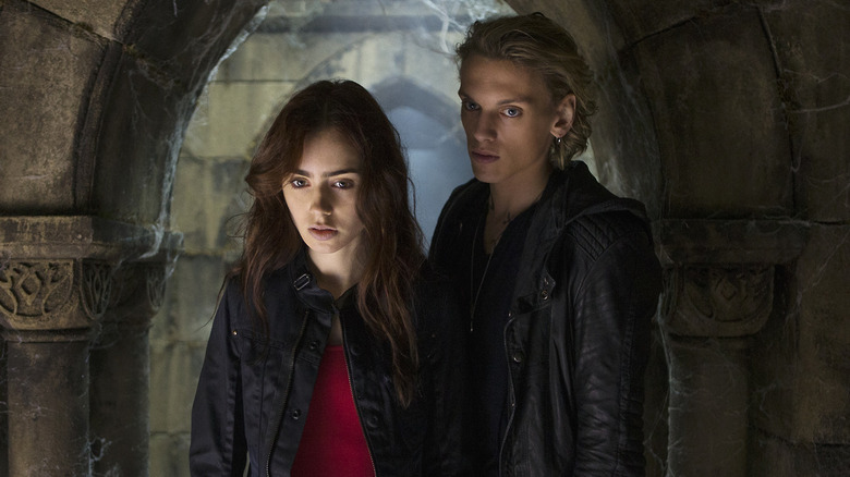 Clary and Jace standing in doorway