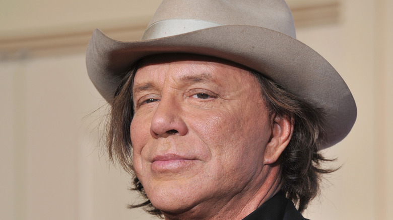 Mickey Rourke wearing cowboy hat 