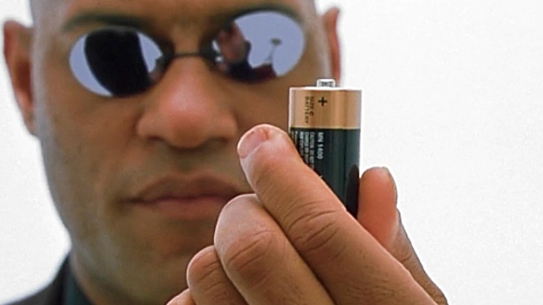 Morpheus holding a battery