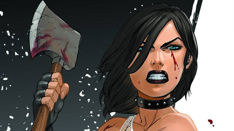 Cassie Hack holding an ax