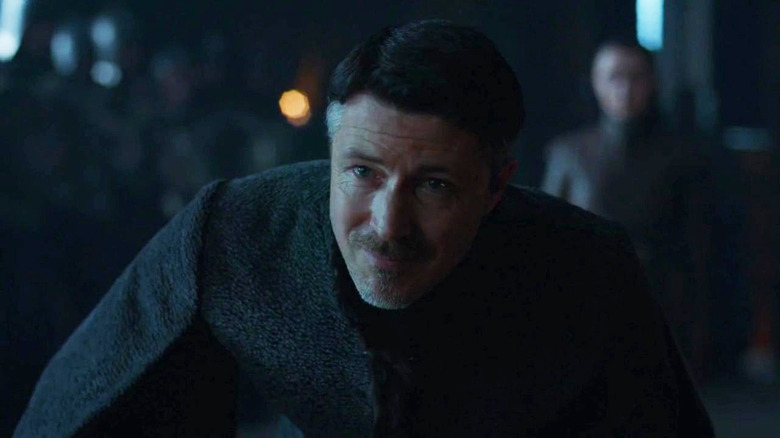 Littlefinger smiling tearfully