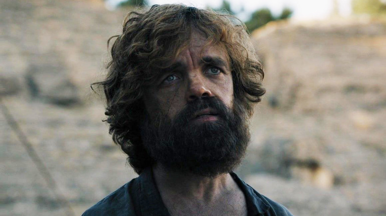 Scruffy Tyrion Lannister looking pensive