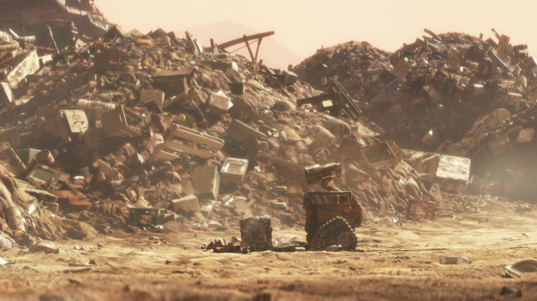 WALL-E picks up trash