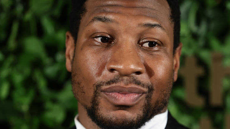 Jonathan Majors on a red carpet