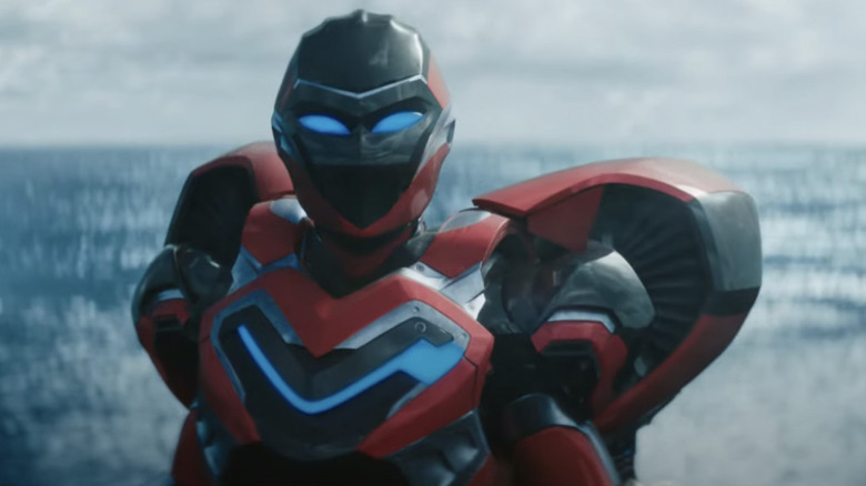 Ironheart flies above the ocean in "Black Panther: Wakanda Forever" (2023)