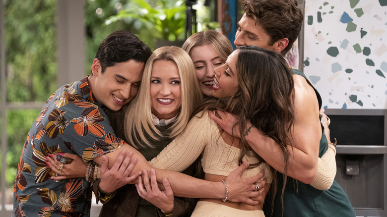 The cast of Pretty Smart hugging