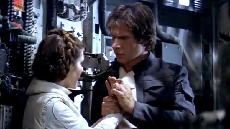 Han hold's Leia's hand