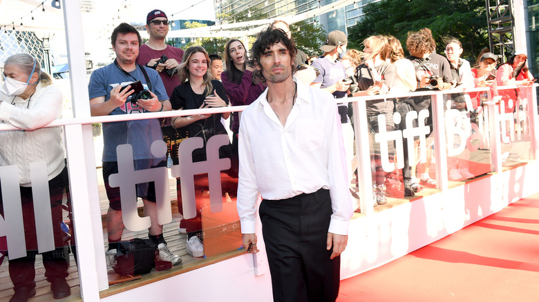 Tyson Ritter attending movie premiere