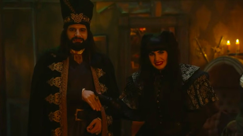 Nandor and Nadja shaking hands in What We Do in the Shadows